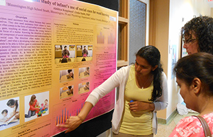 Alekhya explains her poster to viewers